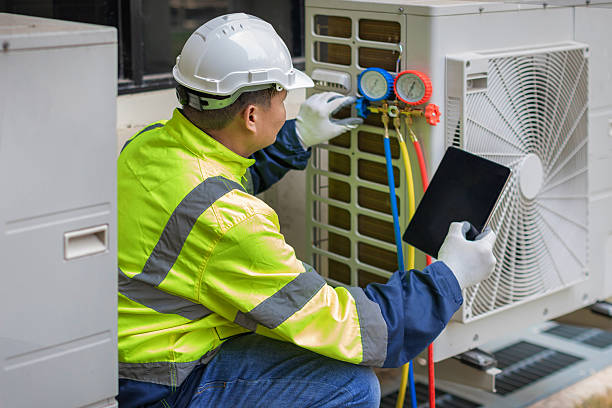 Professional Hvac technician working in Dike, TX